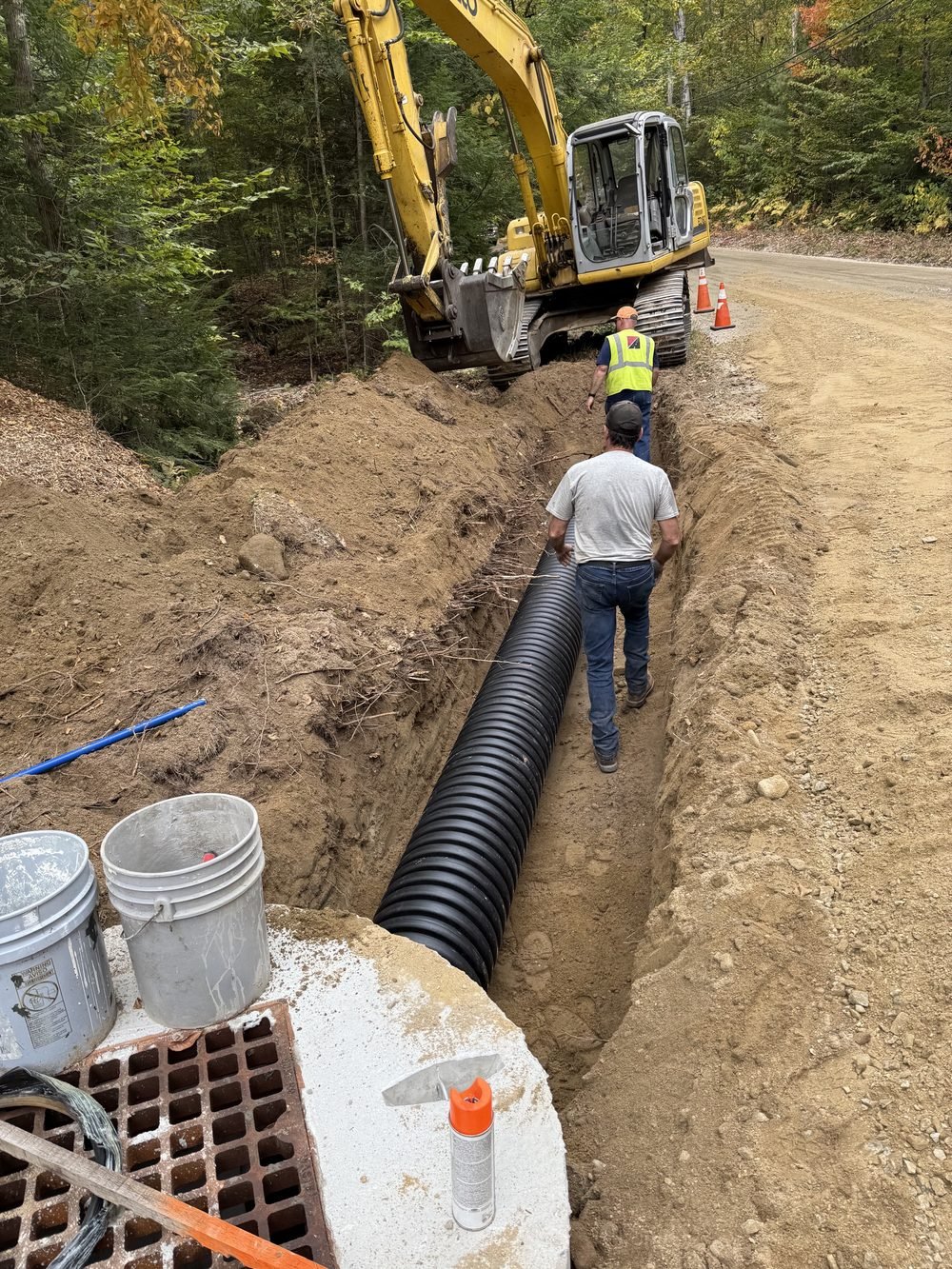 Pipe trench excavation on a Granite State Site Worx job site